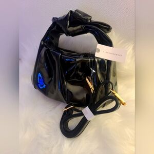 NWT Clutch Patent Bow Bag Anthropologie